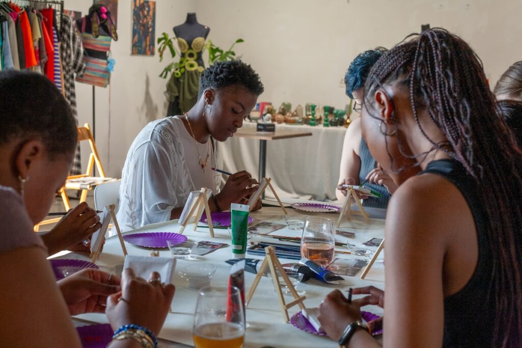 Adults working together at a hands-on skills workshop table