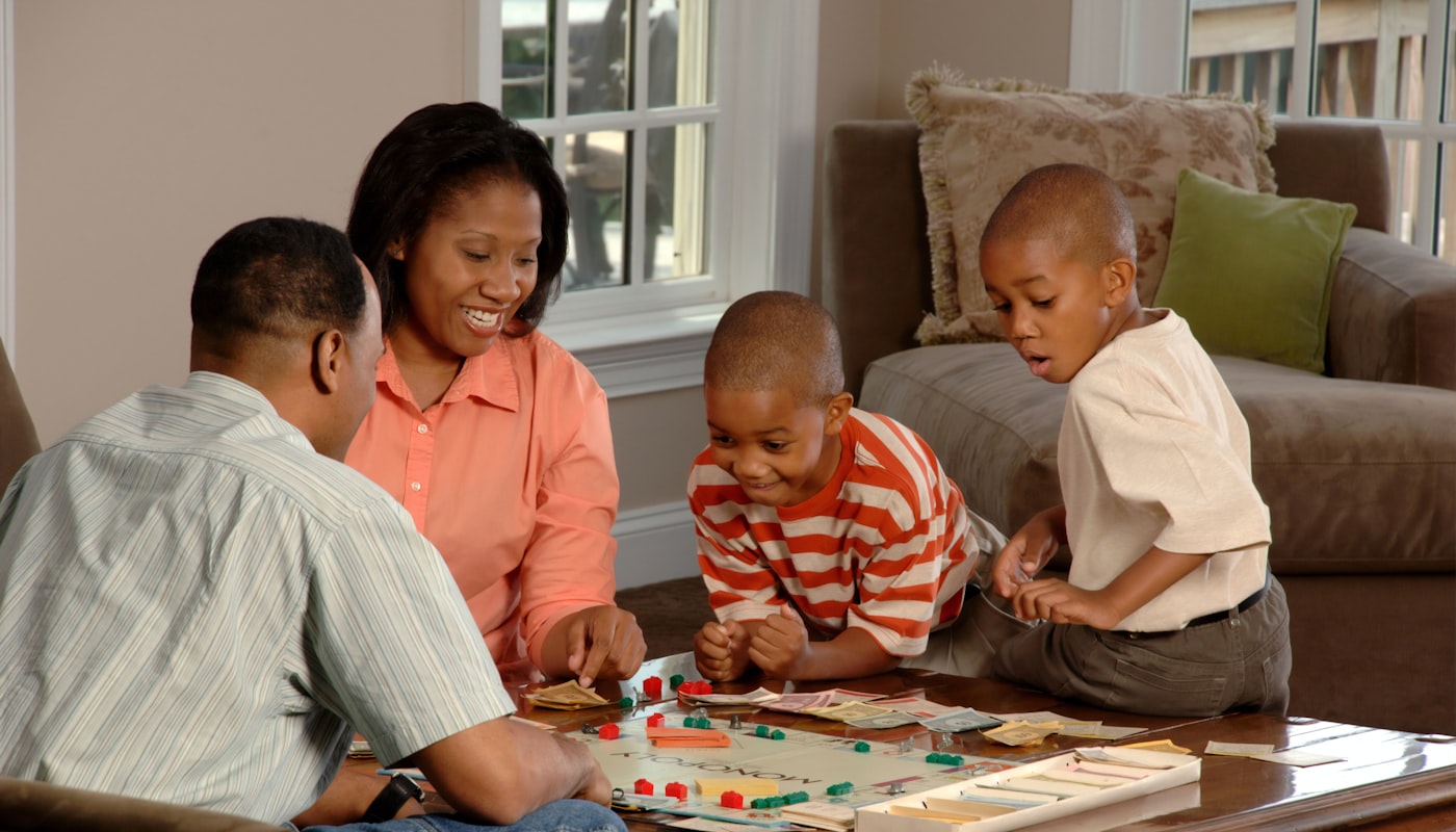 A family spending time together at home around a table